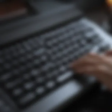 User typing quietly on a membrane silent keyboard