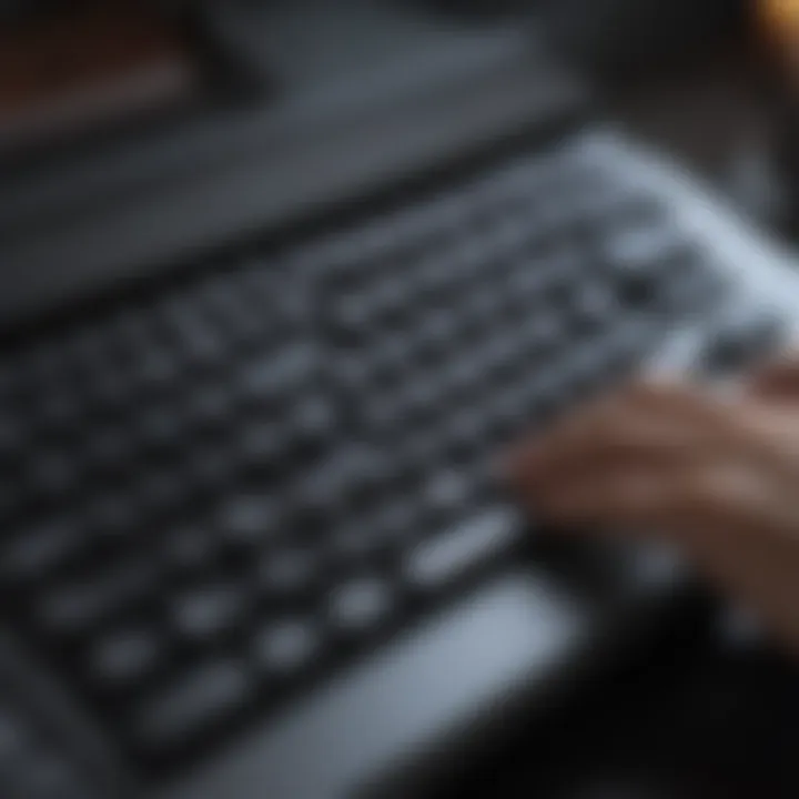 User typing quietly on a membrane silent keyboard